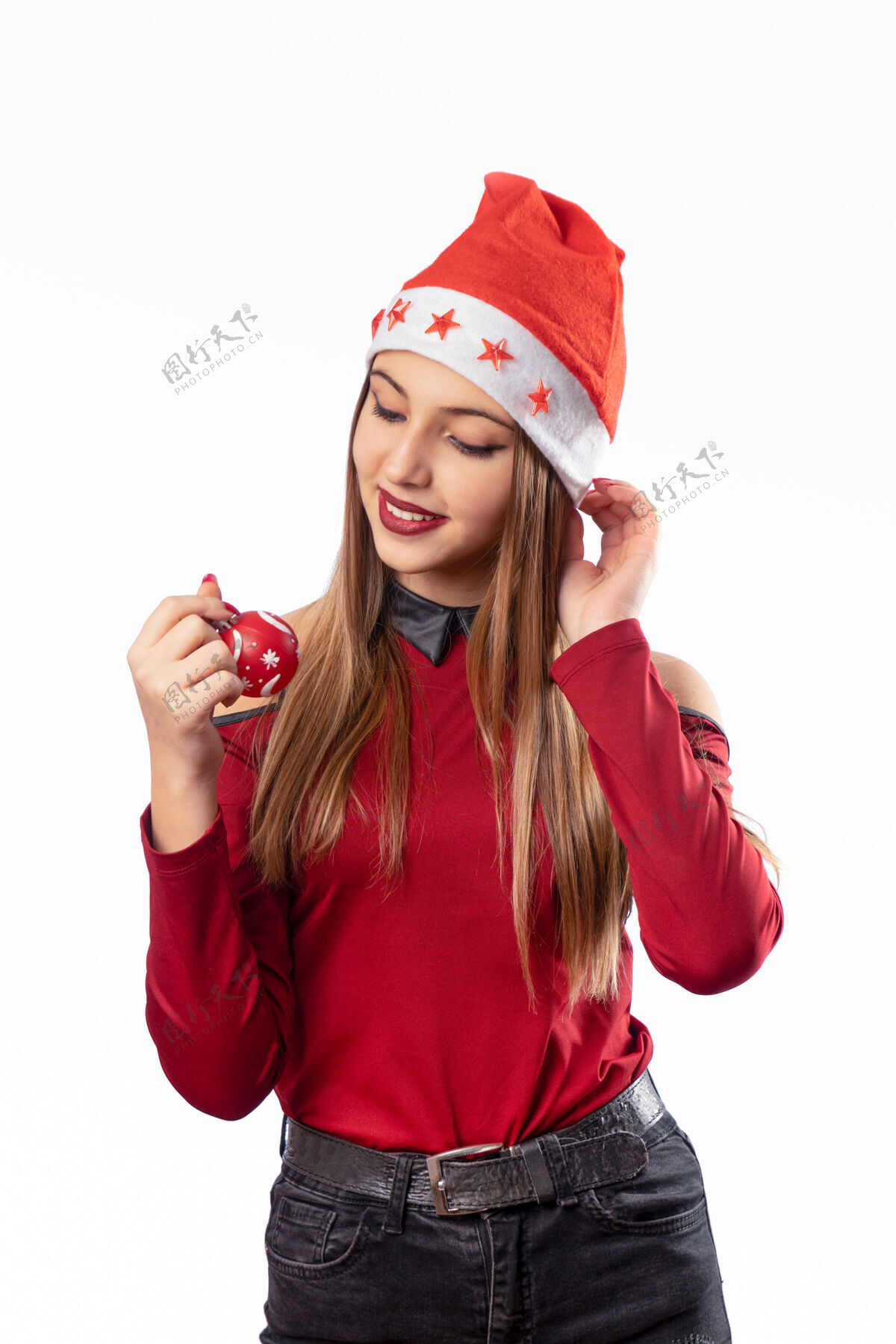 脸穿着红色圣诞装的白衣美女年轻人圣诞老人时尚