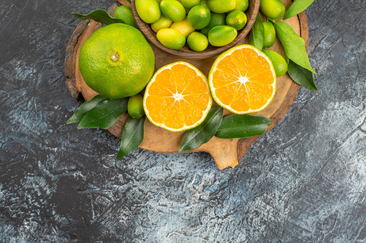 柑橘顶部特写查看柑橘类水果开胃柑橘类水果柑橘柑桔与树叶酸橙多汁健康