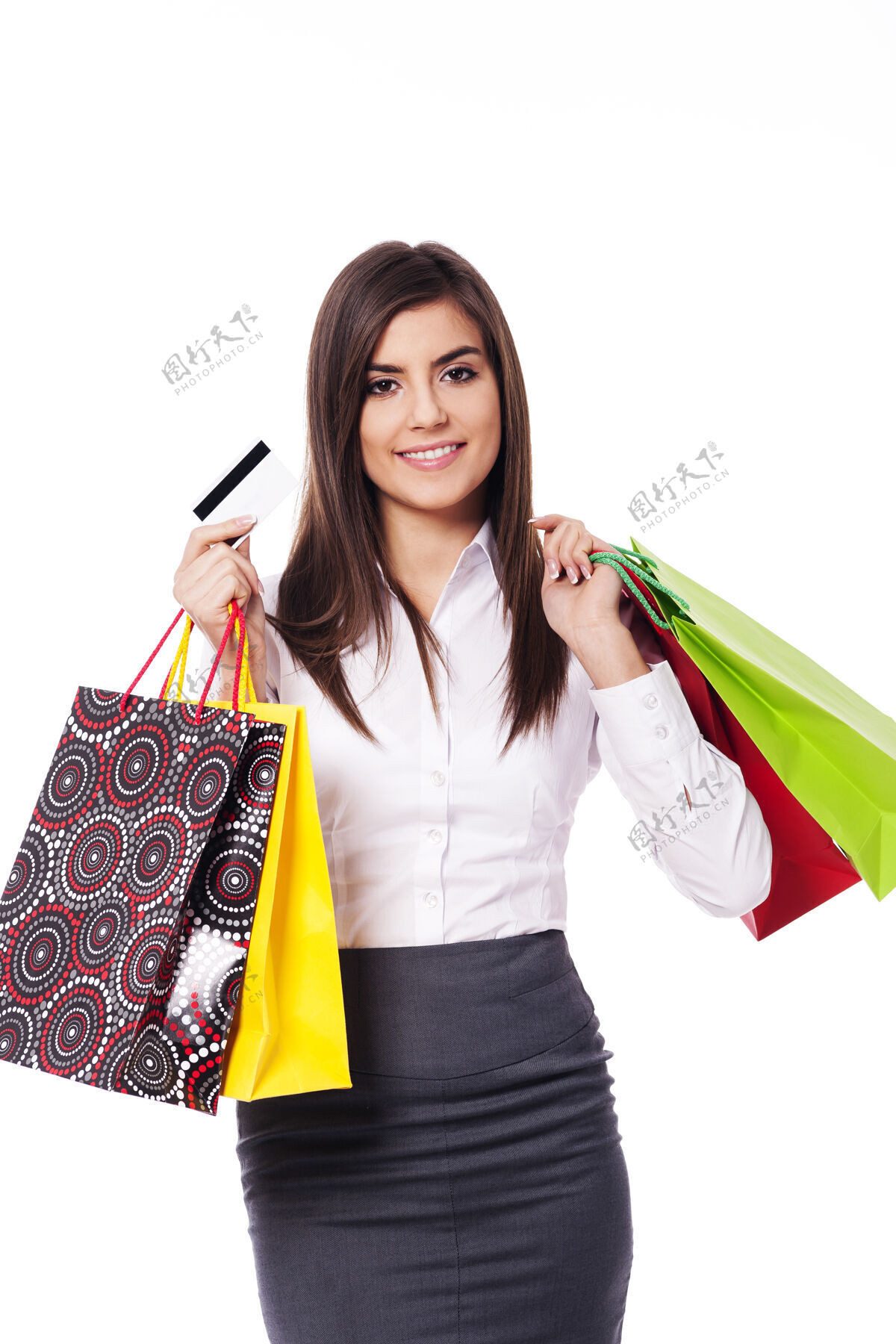 顾客带着购物袋和信用卡的女商人牙齿微笑美丽购买