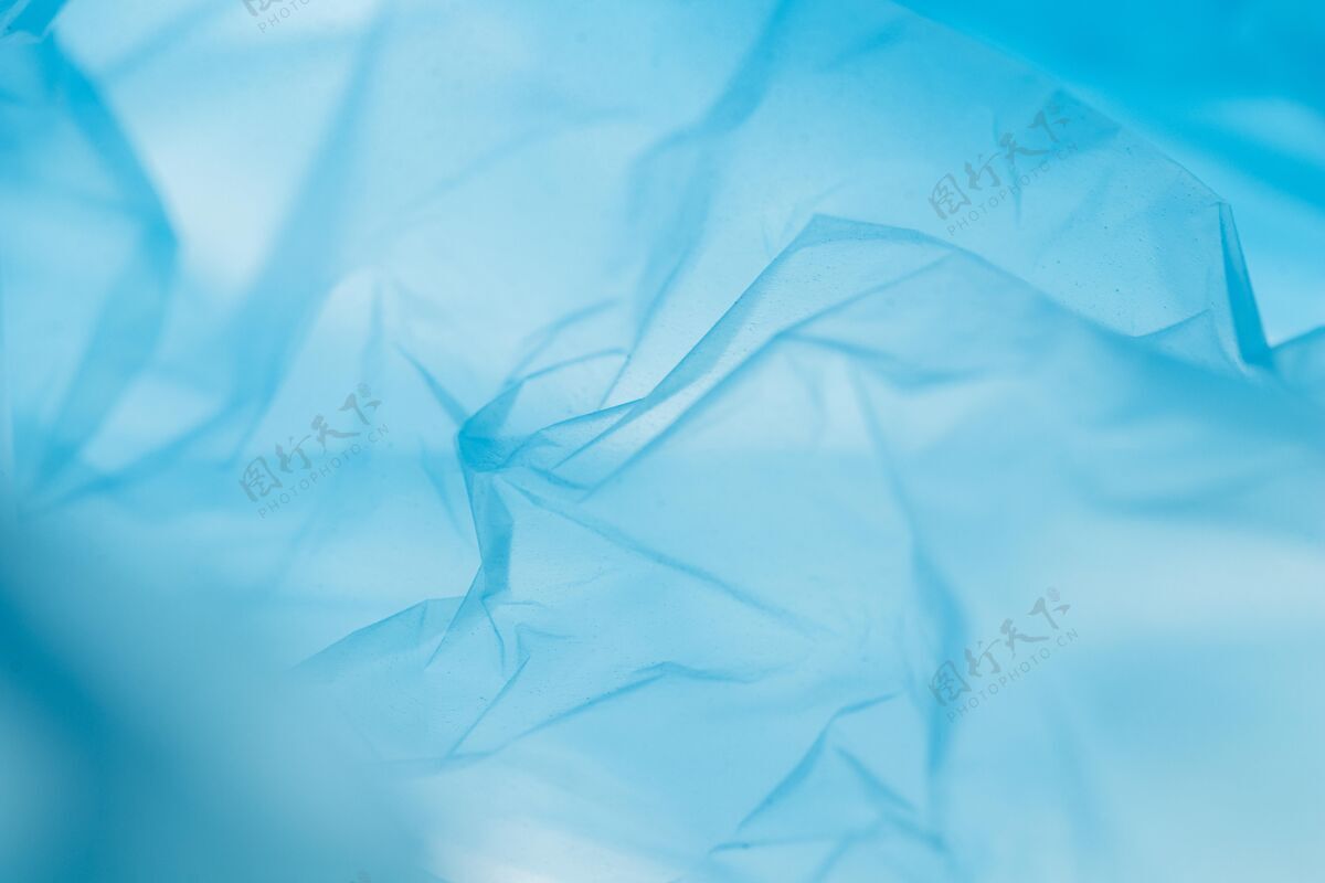 塑料蓝色塑料袋的平面布置壁纸污染光滑