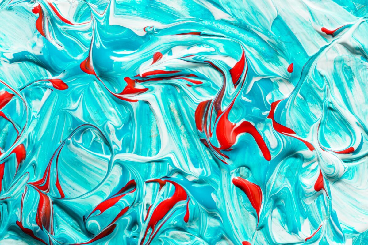 光滑顶视图的创意蓝色和红色油漆的表面一致性五彩液体